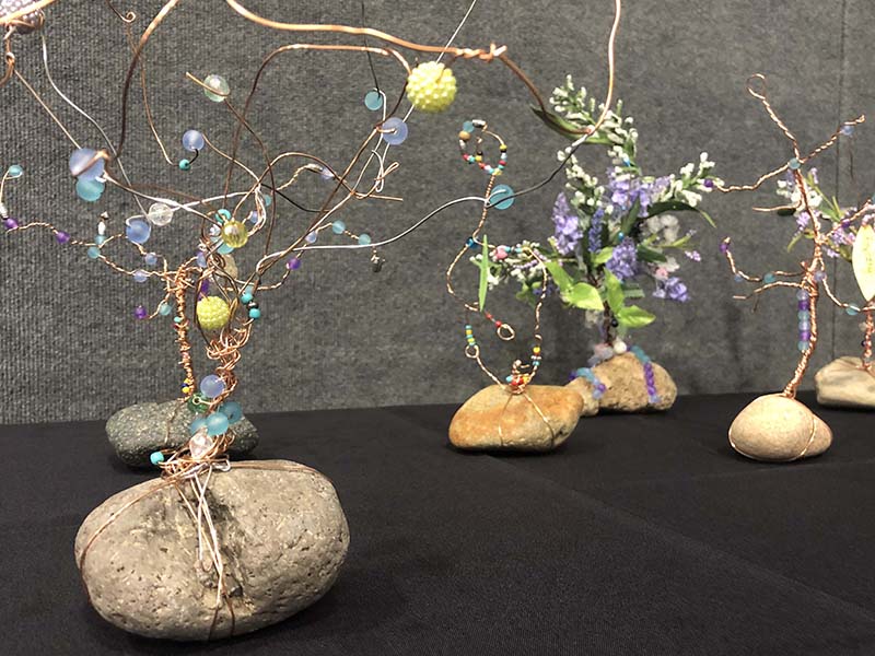 handmade trees made of bent metal wire and found rocks as a base